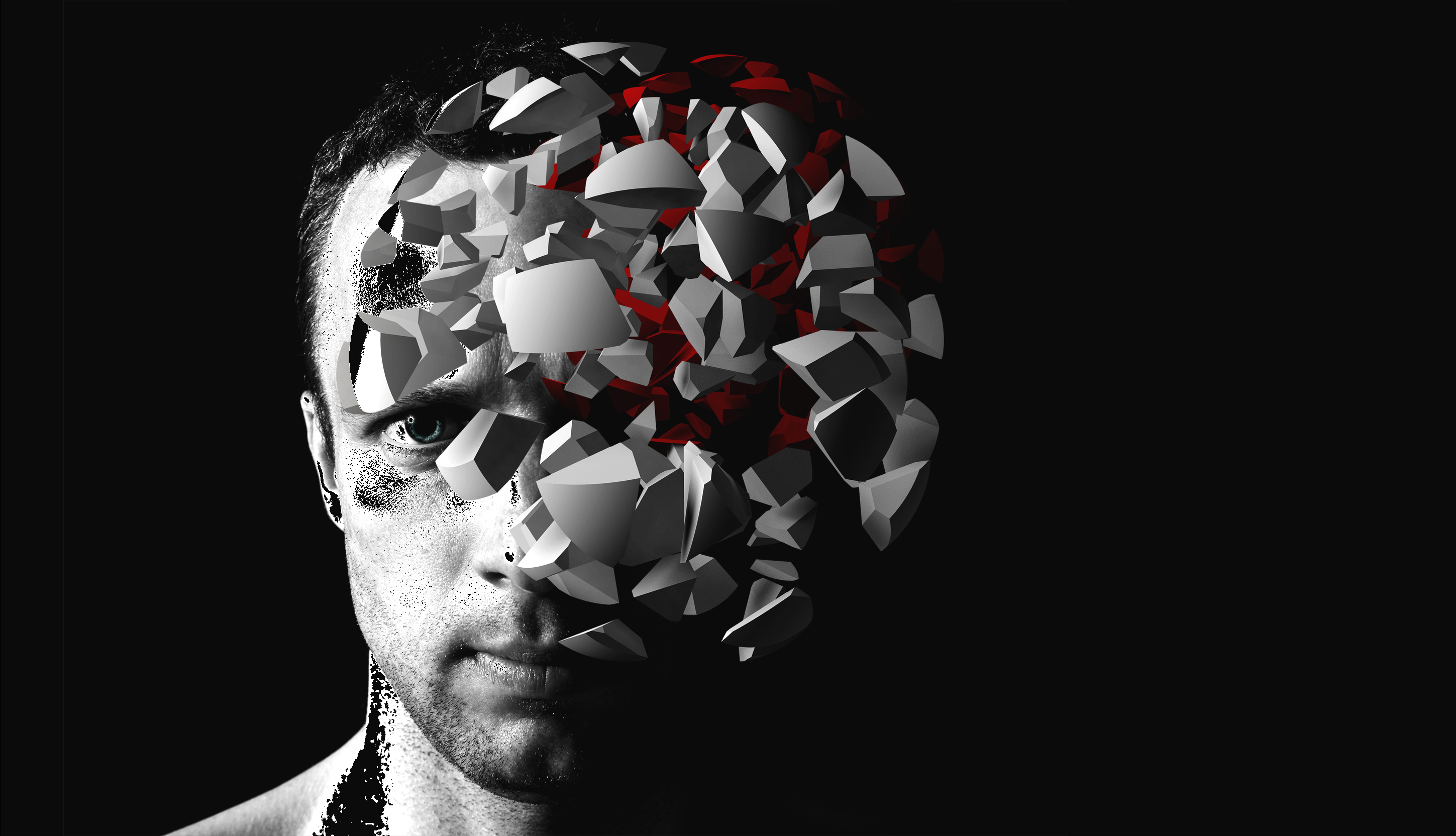 Caucasian man creative portrait with 3d explosion fragments on black background